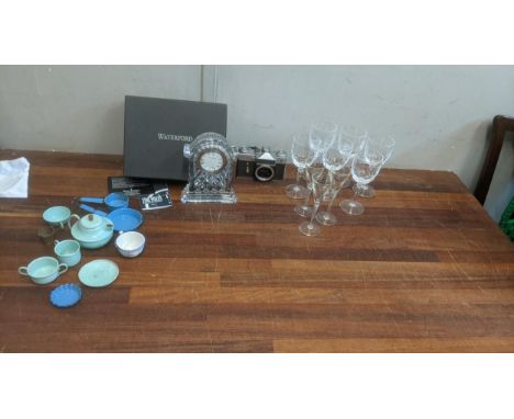 A mixed lot to include a Waterford crystal carriage clock A/F with box, a set of six wine glasses etched design, together wit
