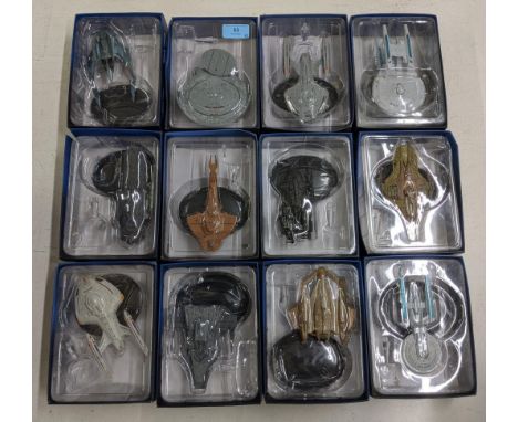 Twelve Star Trek boxed model spacecrafts to include Xindi Insectoid Scout Ship, Lokirrim Warshop Artic One (Assimilated), USS