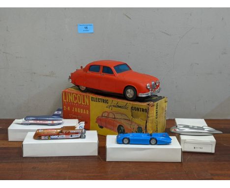 A Lincoln International 2.4 Jaguar electric automatic control model boxed along with boxed models of 1965, Craig Breedlove, S