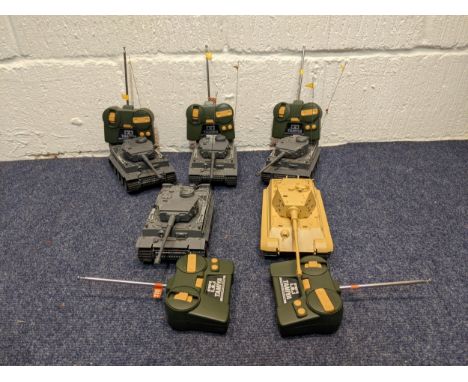 Five Tamiya radio controlled model tanks to include four German tanks, one in desert camouflage liveryLocation:If there is no