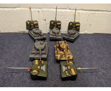 Five Tamiya radio controlled model tanks to include three German tanks, one in camouflage liveryLocation:If there is no condi