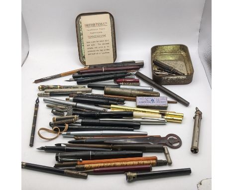 A mixed lot of writing equipment to include a Summit S-100 vintage fountain pen, an Exactus Stapler pen, spare nibs, pencils,