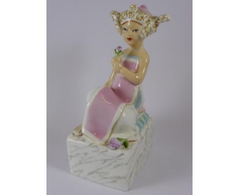 ROYAL WORCESTER PORCELAIN FIGURE 'MAGNOLIA BUD' OF A GIRL SEATED ON A CUSHION HOLDING A FLOWER AND A FAN