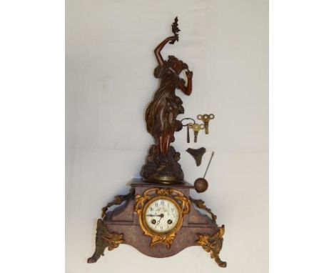 FRENCH ROUGE MARBLE CLOCK MOUNTED WITH SPELTER FIGURE