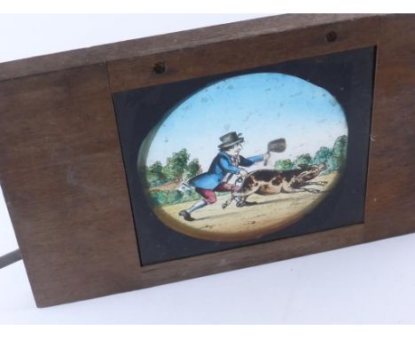 CASE CONTAINING A QTY. MAGIC LANTERN SLIDES INC. 20 HAND PAINTED GLASS SLIPPER SLIDES DEPICTING HUMOROUS SCENES AND OTHER CHI