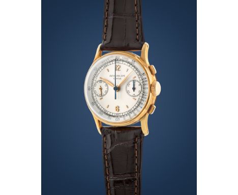 Patek Philippe 130 chronograph, 50s18k gold round case, n.672246, rectangular pushers.Two-tone argenté dial, applied indexes 
