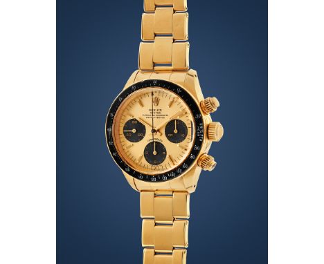 Rolex Daytona 6263, 70s18k gold round case, n.6043492, black acrylic bezel, round screwed pushers.Champagne dial, black count