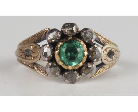 A Georgian Foil Backed Green Paste and Rose Cut Diamond Cluster Ring in a rub over setting, unmarked gold shank, 12mm head, s