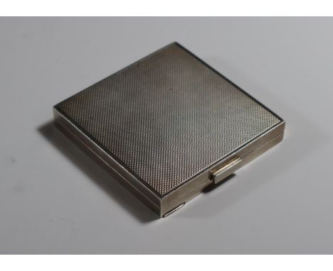 A George VI Silver Compact with engine turned decoration, Birmingham 1944, maker indistinct, 66x64cm, 97.9g 