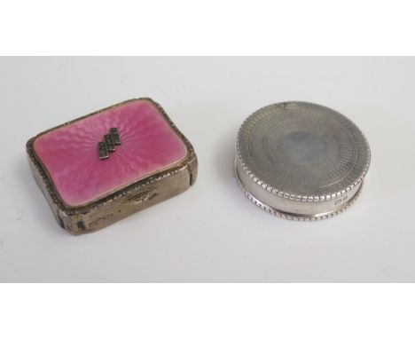 A Silver, Pink Guilloché Enamel and Marcasite Patch Pot with mirrored lid (London 1928 import marks, 40x34mm, 23g gross) and 