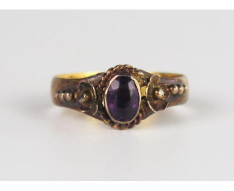 A Pretty Victorian 22ct Gold and Amethyst Ring with flowers to the shoulders, Birmingham 1883, maker SH, size L, 2.9g. Under 