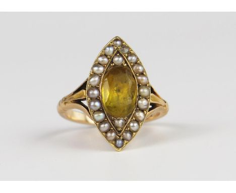 An Antique Foil Backed Paste and Pearl Marquis Shaped Ring in an unmarked gold setting, 20 x 11 mm head, sizeK.5, 4.6g 