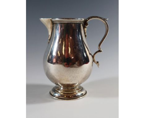 A George V Britannia Standard Silver Sparrow Beak Milk Jug, London 1923, K&amp;Co., 10.5cm high, 253g. Dent to one side and n
