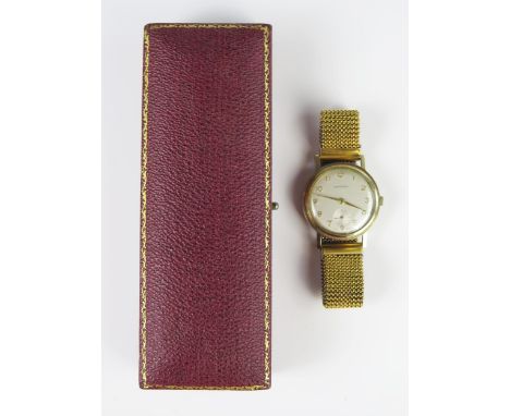 A Gent's GARRARD 9ct Gold Dress Wristwatch in a Dennison Aquatite 34 mm case, back no 349986, manual wind 17 jewel movement, 