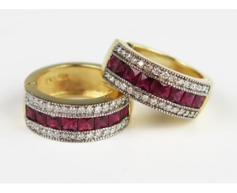 A Pair of 14K Yellow Gold, Channel Set Ruby and Diamond Hoop Earrings, 21.5 mm outer diameter, 18 mm wide, 12.2 gSold on beha