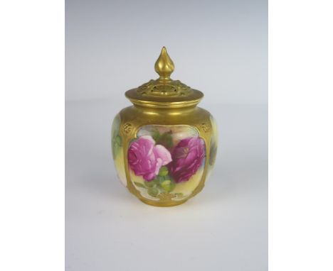 A Royal Worcester Potpourri Vase with reticulated cover and decorated with roses, 1922 model 162, 12 cm. Finial glued