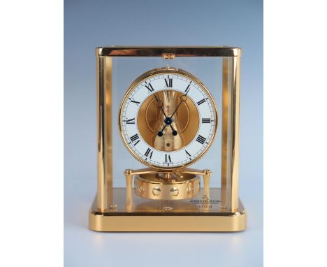 A Jaeger-LeCoultre Atmos Clock, Cal 540 13 jewel movement, white enamelled dial with black Roman numeral hour markers and out