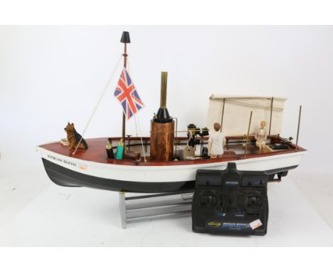 Painted plywood and plastic model of the 'African Queen', with engine and powered rudder, 71cm long, with controller,