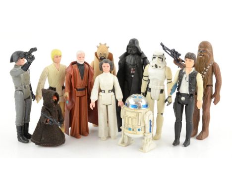 Eleven Kenner 1977 3 3/4" Star Wars figures, comprising Luke Skywalker with single telescope light sabre, Obi Wan Kenobi with