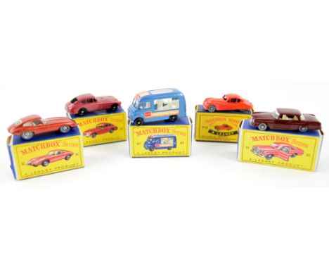 Five Matchbox model cars, comprising 32 E-Type Jaguar, 32 Jaguar XK140, 47 Lyons Maid Ice-Cream Mobile Shop, 53 Aston Martin,