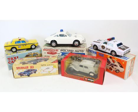 Japanese and Chinese tin-plate and plastic model cars, to include Police Cars, Taxi Cabs, others and two Burago model cars, a