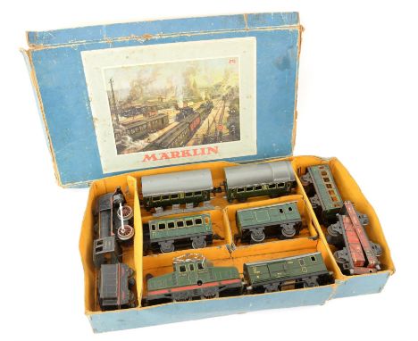 Marklin O gauge tin plate clockwork train set, comprising locomotive R890 and tender, steeplecab locomotive RV890, and wagons