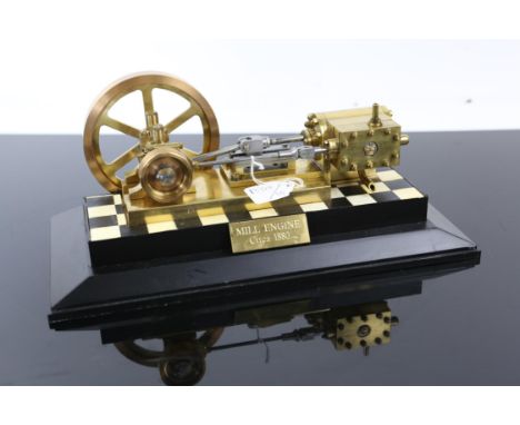 Scratch built brass and steel model of a Mill Engine with wheels and pistons, on integral plastic base, inscribed to base, W 