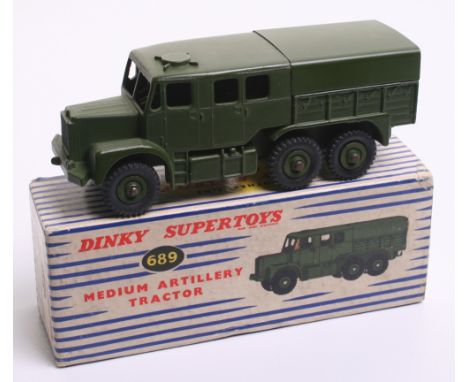 Dinky Toys 689 Medium Artillery Tractor, military green,with driver, in near mint condition, with a very good blue/white stri