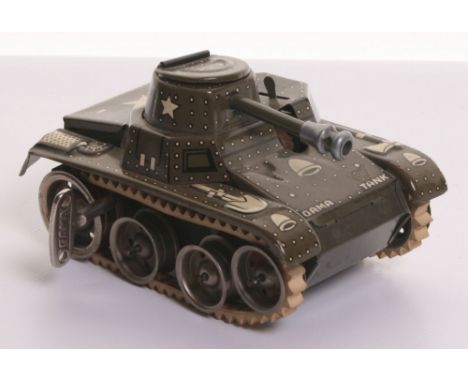 Gama (Germany) Tinplate Clockwork Tank, military green, white rubber tracks, working motor, complete with Gama key, in near m