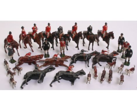Quantity Of Britains and Other makers of Hunting Figures, including  10 x mounted,6 x foot, 13 x fox hounds all Britains and 