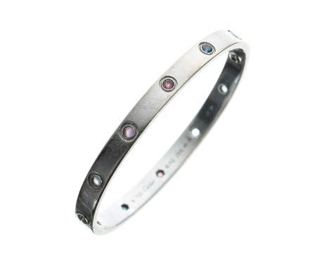 Cartier 18ct white gold 'Love' gemstone bangle, signed, no.&nbsp;PQ2915, 33.9gm, 65mm&nbsp;(missing stone, slightly bent with