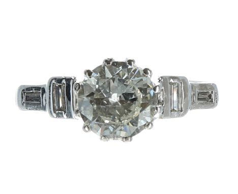 Good brilliant-cut diamond solitaire ring, with diamond shoulders in a white metal setting, 1.03ct approx, clarity SI, colour