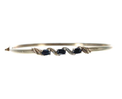 9ct sapphire and diamond bangle, 4.3gm 