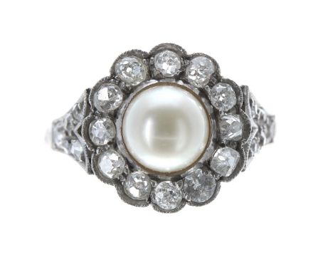 Attractive cultured pearl and diamond cluster ring, with old-cut diamond shoulders set in a white metal mount, either white g