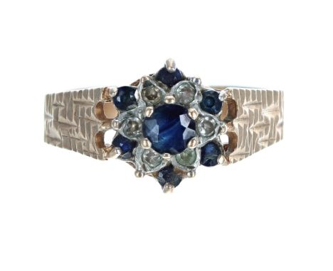 9ct sapphire and diamond cluster ring, width 10.5mm, 2.5gm, ring size O 