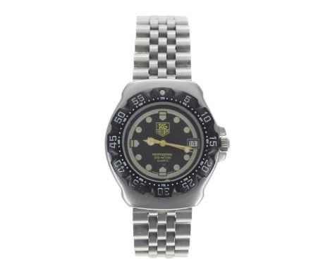 Tag Heuer Formula 1 stainless steel gentleman's wristwatch, quartz, 37mm-** with a part box and instruction booklets-Movement