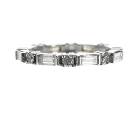 White metal baguette and round diamond set full eternity ring signed Graff, no. 11556, width 3mm, estimated 1.20ct approx in 