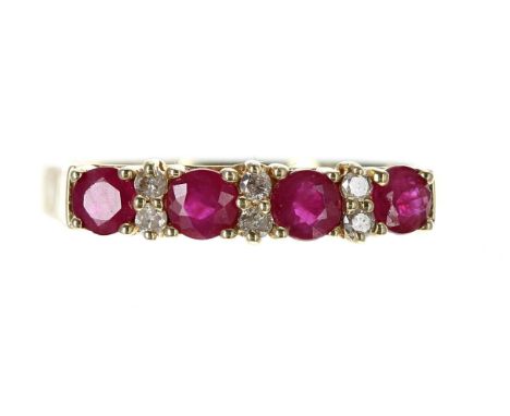 14ct ruby and diamond ring in a scroll setting, width 4mm, 2.3gm, ring size O 