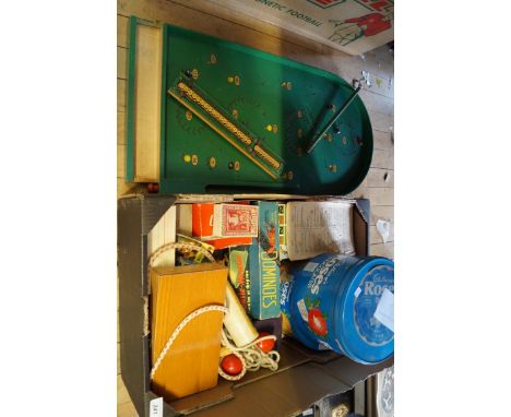 A quantity of assorted vintage games to include International Munro, bagatelle board etc.