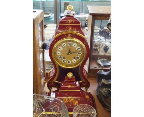 A contemporary Zenith red lacquered bracket clock with bracket.