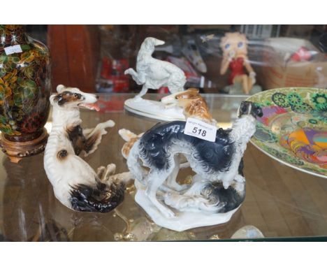 A mixed group of ceramic models of Borzoi dogs to include a Made In USSR example and a Royal Worcester example. (4)