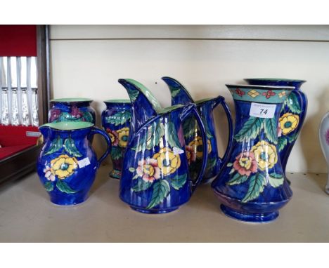 Seven pieces of H&K Tunstall ware to include a pair of Art Deco jugs.