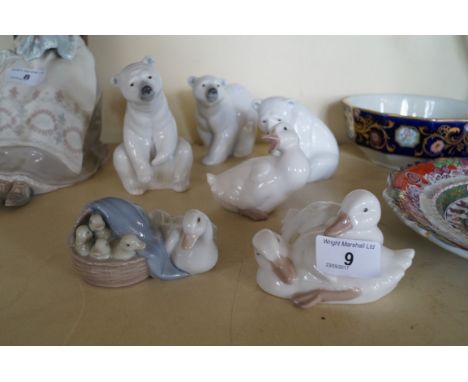 Six Lladro and Nao ceramic models of polar bears and ducks.