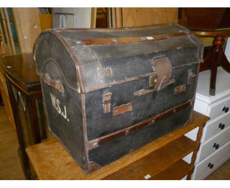 A vintage wooden bound storage trunk