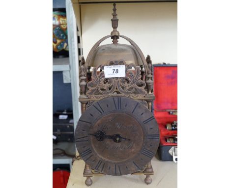 A reproduction French style brass bracket clock.