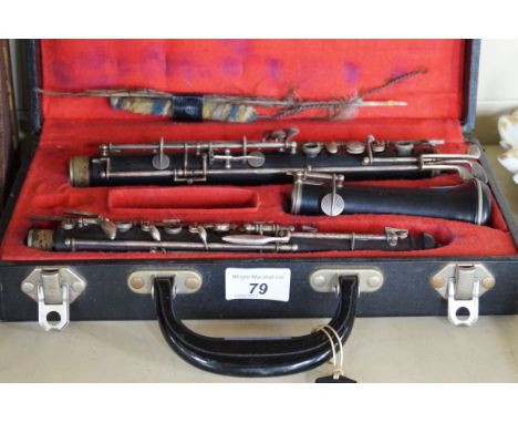 A Vintage cased Cahart French clarinet    CONDITION REPORT:  'Cabart' Parisx8 impressed marks 