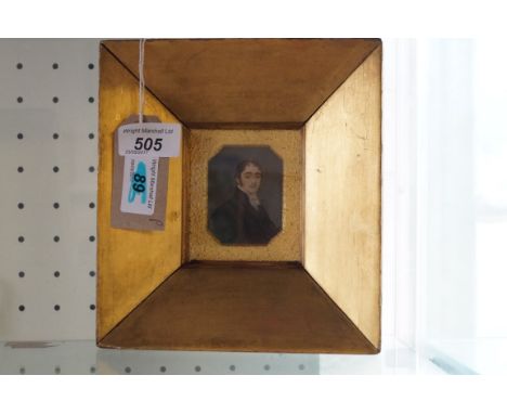 An early 19th Century watercolour portrait miniature Depicting a gentleman wearing a black coat, inset within gilt frame, 19 