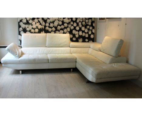 AN ITALIAN LEATHER L-SHAPED HABART SOFA, BY MAX DIVANI, upholstered in cowhide, on chrome supports, bearing label