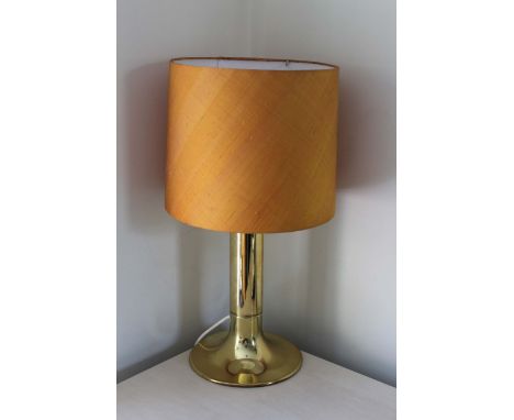 A GILT TABLE LAMP BY HANS-AGNE JACOBSEN, SWEDEN, with olden shade, 63cm high (incl shade)