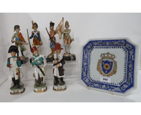 A decorative Versailles plate, together with assorted ceramic and composite military figures Condition Report: Available upon